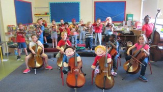 Wally with children in orchestra.jpeg