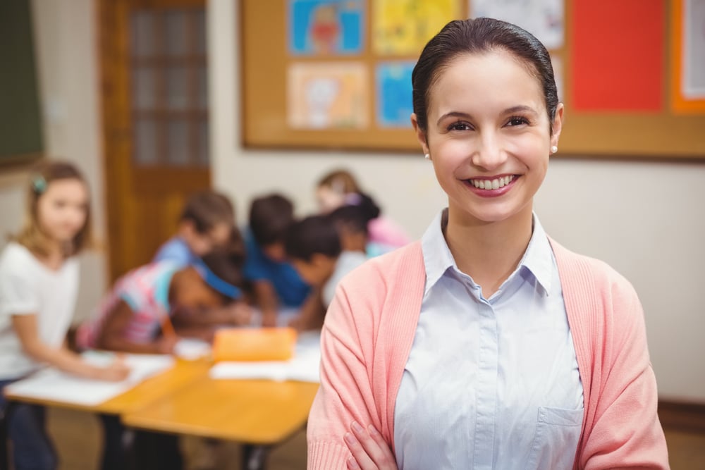 Educator Teaching SEL Curriculum and Smiling