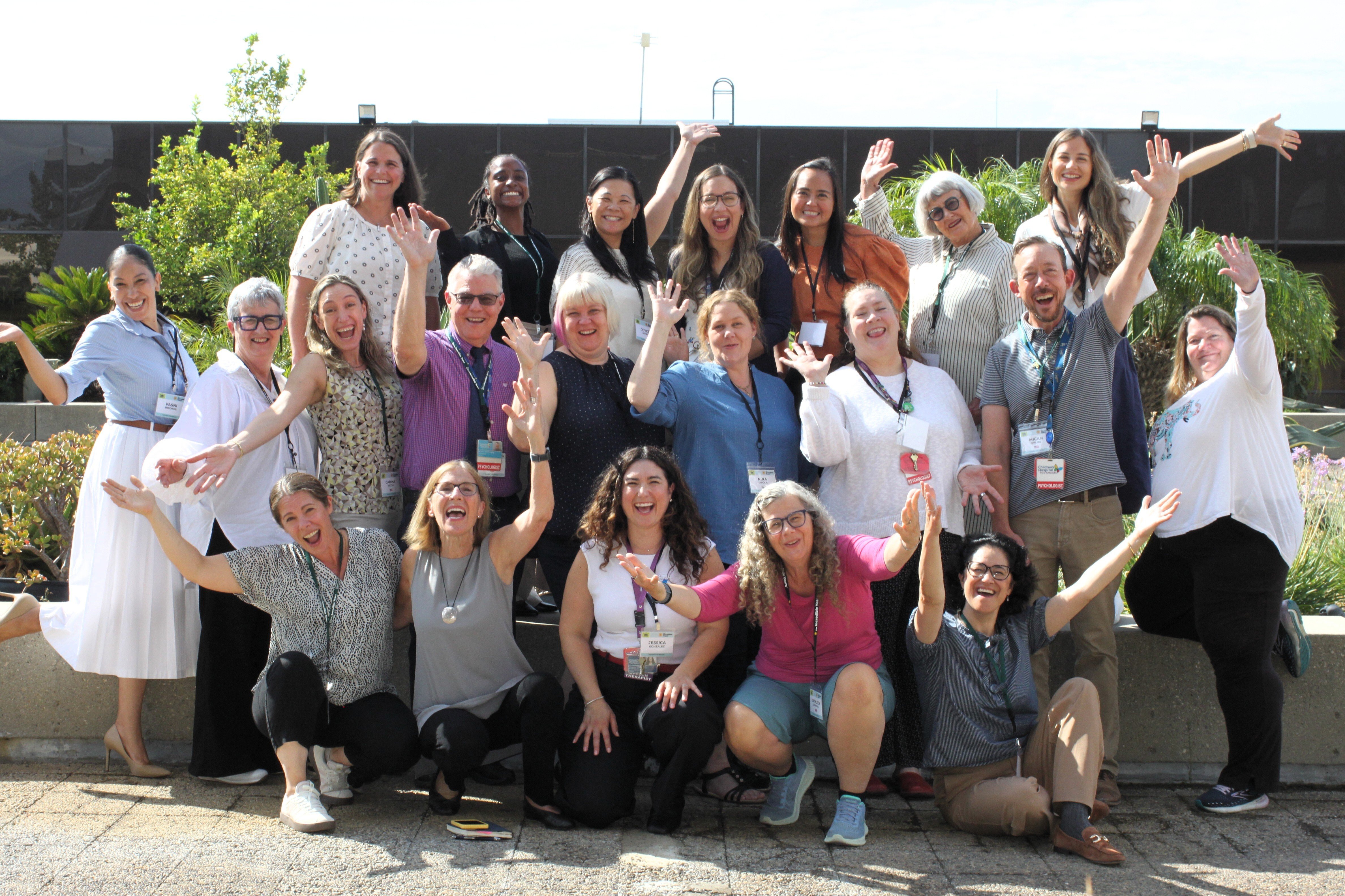 mentors hands in air