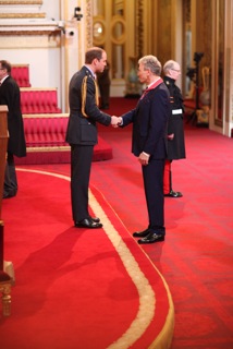 Stephen shaking hands with Prince William